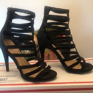 Gently worn black stilettos